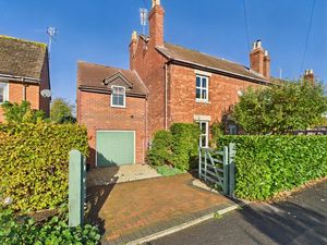 Front Aspect With Parking - click for photo gallery